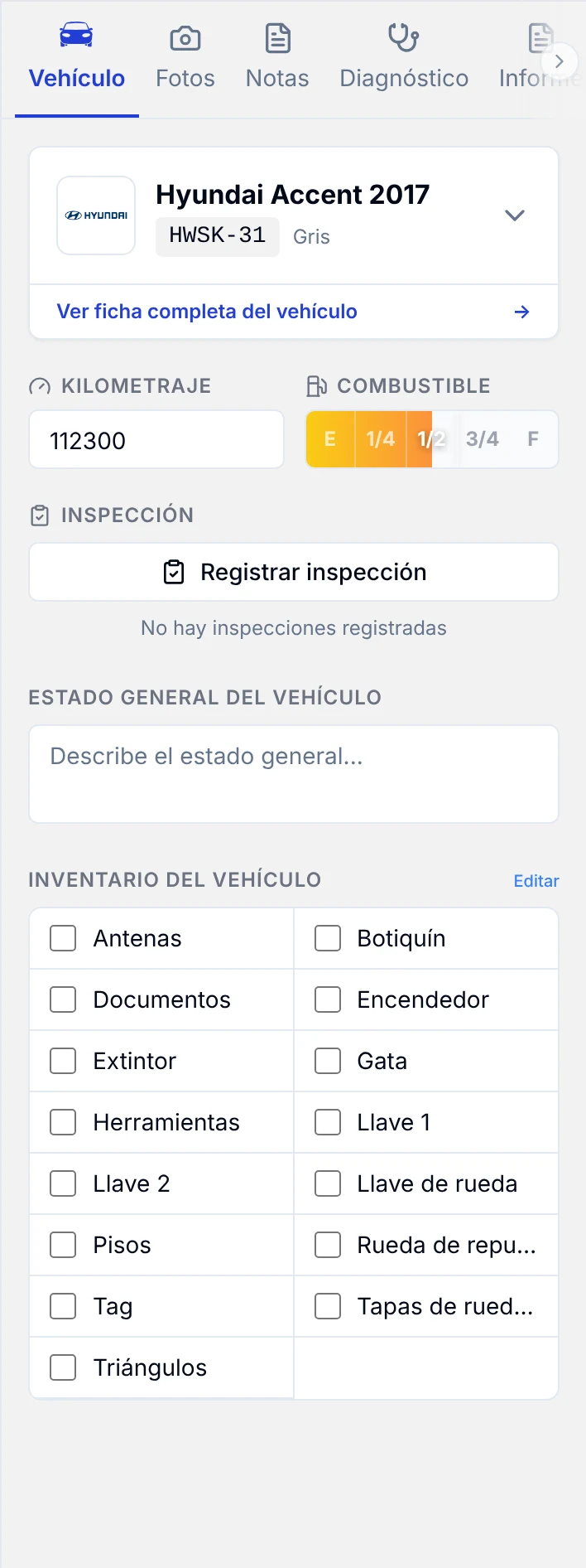 Pestaña Vehículo con kilometraje, combustible, inspección, estado general e inventario