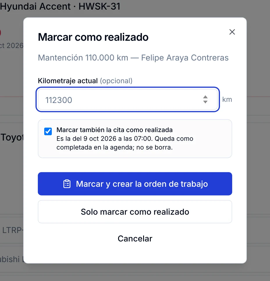 Ventana Marcar como realizado con kilometraje actual y las dos formas de cerrar el mantenimiento
